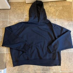 Reserved Black Hoodie with Subtle Embroidered Script